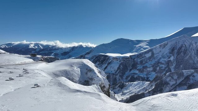 Aerial view of beautiful snowy mountains in Gudauri, Georgia