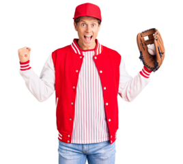 Young handsome man wearing baseball uniform holding golve and ball screaming proud, celebrating victory and success very excited with raised arms