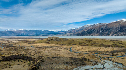 Drone  photo of the arid desert like Hakatere Valley and southern alps in the Ashburton Highlands