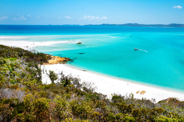 Boats transporting tourists to Whitehaven Beach is on Whitsunday Island. . The beach is known for its crystal white silica sands and turquoise colored waters. Autralia, Dec 2019