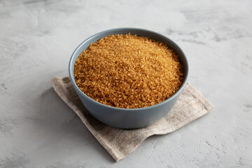 Organic Brown Sugar in a Bowl, side view.