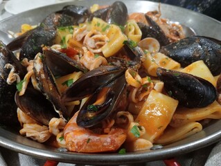 seafood paella in a pan