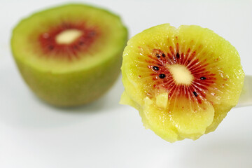 close up of a slice of kiwi rouge