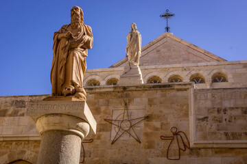 The statue of Jerome of Stridon, the Christian scholar and Bible translator, in front of Church of...