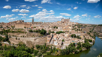 Fototapeta na wymiar Aerial view of the old on the hill of Toledo, Spain on a sunny day