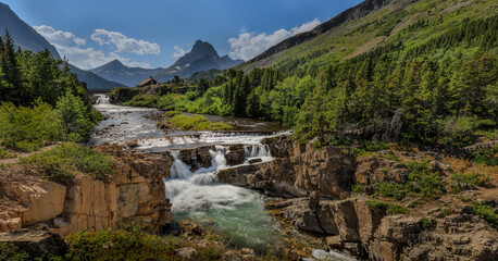 Naklejka na ściany i meble Waterfall in Glacier National Park