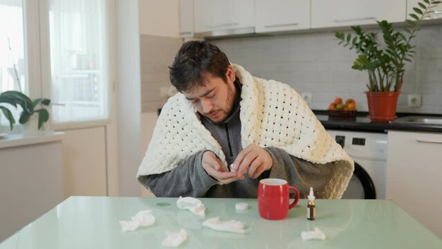 Objective Reality Bearded Man Takes Flu Pills in Kitchen Amid Seasonal Suffering