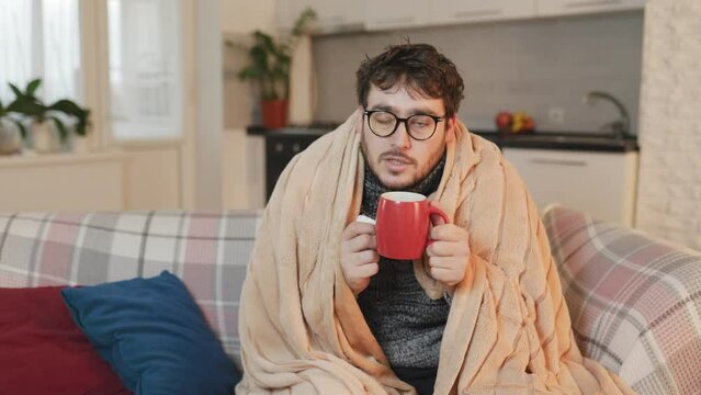 Shivers in Shades The Poignant Melancholy of a Man Battling the Cold at Home