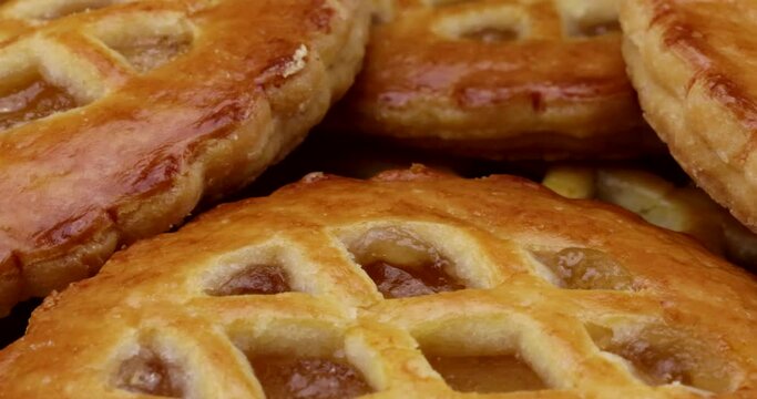 Macro video of small delicious apple pies 