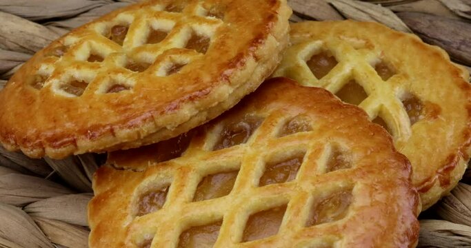 Close up video of apple pies on a turntable