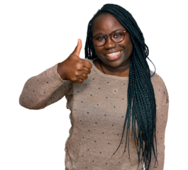 Young black woman with braids wearing casual clothes and glasses smiling happy and positive, thumb up doing excellent and approval sign