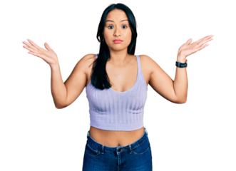 Beautiful hispanic woman wearing casual style with sleeveless shirt clueless and confused with open arms, no idea and doubtful face.