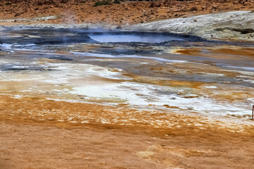 Steaming hot springs on the volcanic sulphur fields of Iceland.