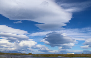 Spectacular UFO clouds in the sky over Iceland - Altocumulus Lenticularis.