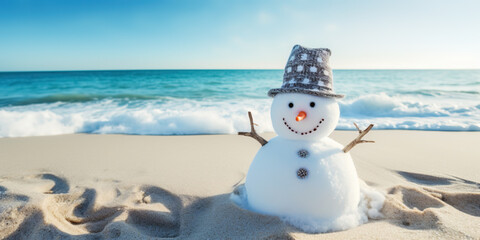 Melting snowman on beach with patternd hat and scarp next to high waves