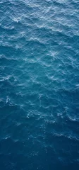 Poster Top view of blue frothy sea surface. Shot in the open sea from above. © Rafa Fernandez