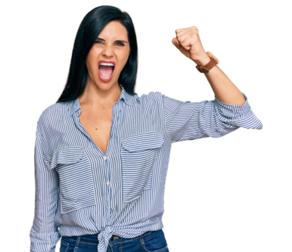 Young caucasian woman wearing casual clothes angry and mad raising fist frustrated and furious while shouting with anger. rage and aggressive concept.