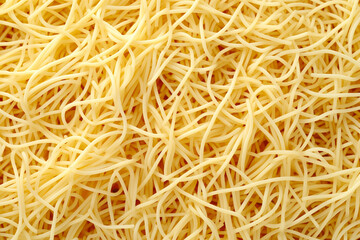 Close up of spaghetti noodles, thin and yellow