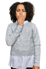 Young little girl with afro hair wearing casual clothes bored yawning tired covering mouth with hand. restless and sleepiness.