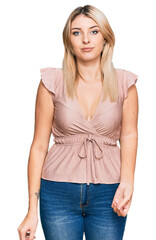 Obraz premium Young caucasian woman wearing casual clothes relaxed with serious expression on face. simple and natural looking at the camera.