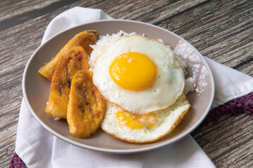 White rice with english fried egg and fried bananas cuban food simple comfort food