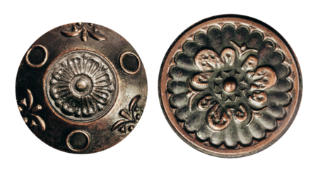 Isolated photo of copper round antique handles on white background.