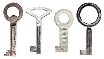 Isolated photo of old fashioned rusty keys set on white background.