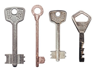 Isolated photo of old fashioned rusty keys set on white background.