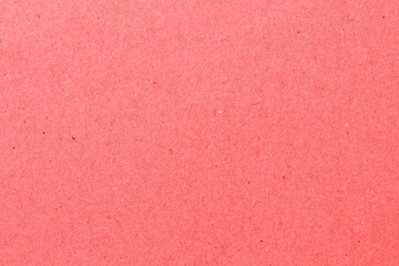 red paper background texture light rough textured spotted blank copy space background in red , pink