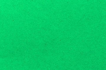 green  paper background texture light rough textured spotted blank copy space background in red , pink