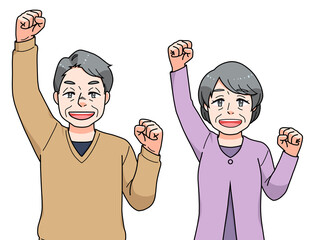 ガッツポーズのシニアの男女