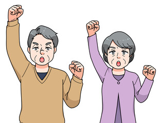 ガッツポーズのシニアの男女