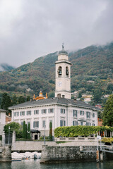 Bell tower near an old villa on the shores of Lake Como. Cernobbio, Italy