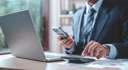 Obraz premium business, chart, pie, graph, investment, finance, diagram, pie chart, financial, growth. businessman putting formal suit typing keyboard with pie chart document showing company financial information.