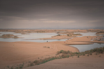 The river going through the desert in Wuhai, Inner Mongolia, China