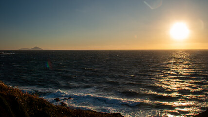 伊豆大島の冬　夕陽と海の絶景　利島、新島遠景　