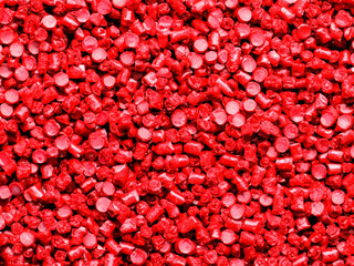red plastic pellets background
