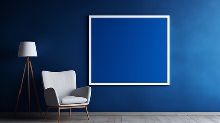 Elegant royal blue chair and table ensemble against a stylish charcoal wall with blank white frame – minimalist interior design concept