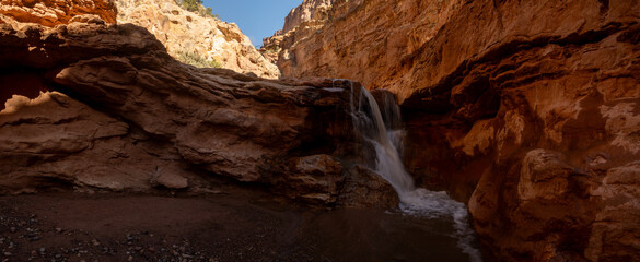 Panorama Of Strong Waterfall In The Red Rocks Of Capitol Reef