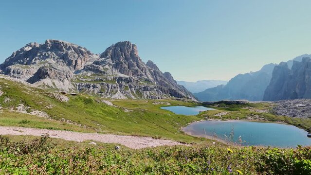 crystal-clear Laghi dei Piani at Dolomite Mountains in summer day. High quality 4k footage
