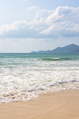Fototapeta na wymiar KOH SAMUI, THAILAND - JANUARY 14,2024: Beautiful beach. View of nice tropical beach with white sand ,blue sea and blue sky. Holiday and vacation concept. Tropical beach Chaweng Noi beach, Samui.