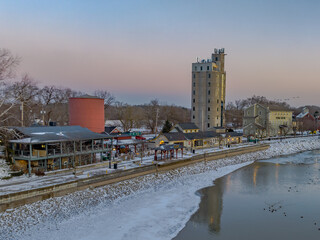 Early evening winter aerial photo of Schoen Place and the Erie Canal in the Village of Pittsford,...