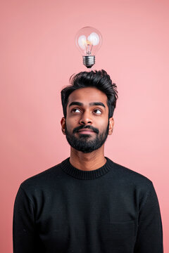 A thinking indian man with a lightbulb on his head