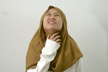 Woman touching her throat, feeling thristy, ramadan fasting, person suffering from heat wave concept