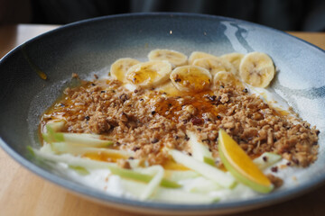 Breakfast Granola Bowl With Banana And honey
