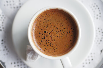 a cup of turkish coffee on table 