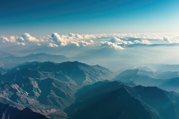 A breathtaking aerial view of a mountain range Showcasing the grandeur and scale of nature's landscapes