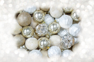 Fototapeta na wymiar Holiday Christmas decoration balls with gold and silver bokeh