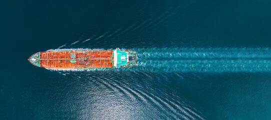 Oil tanker ship. Red Oil Tanker runing in the ocean sea. petroleum ship transportation import...