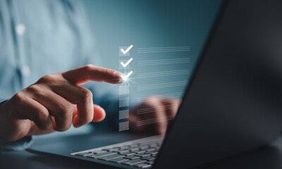 Businessman marks checkboxes. The survey form, check marks on a checklist, fill out online form, and answer questions. List options for business security procedures followed office. Checklist concept.